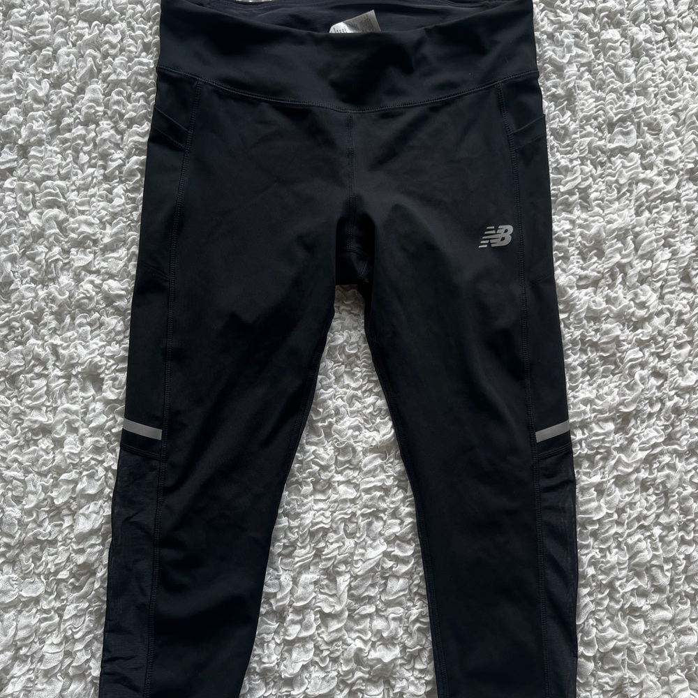 Women’s New Balance capri tights in black size Large